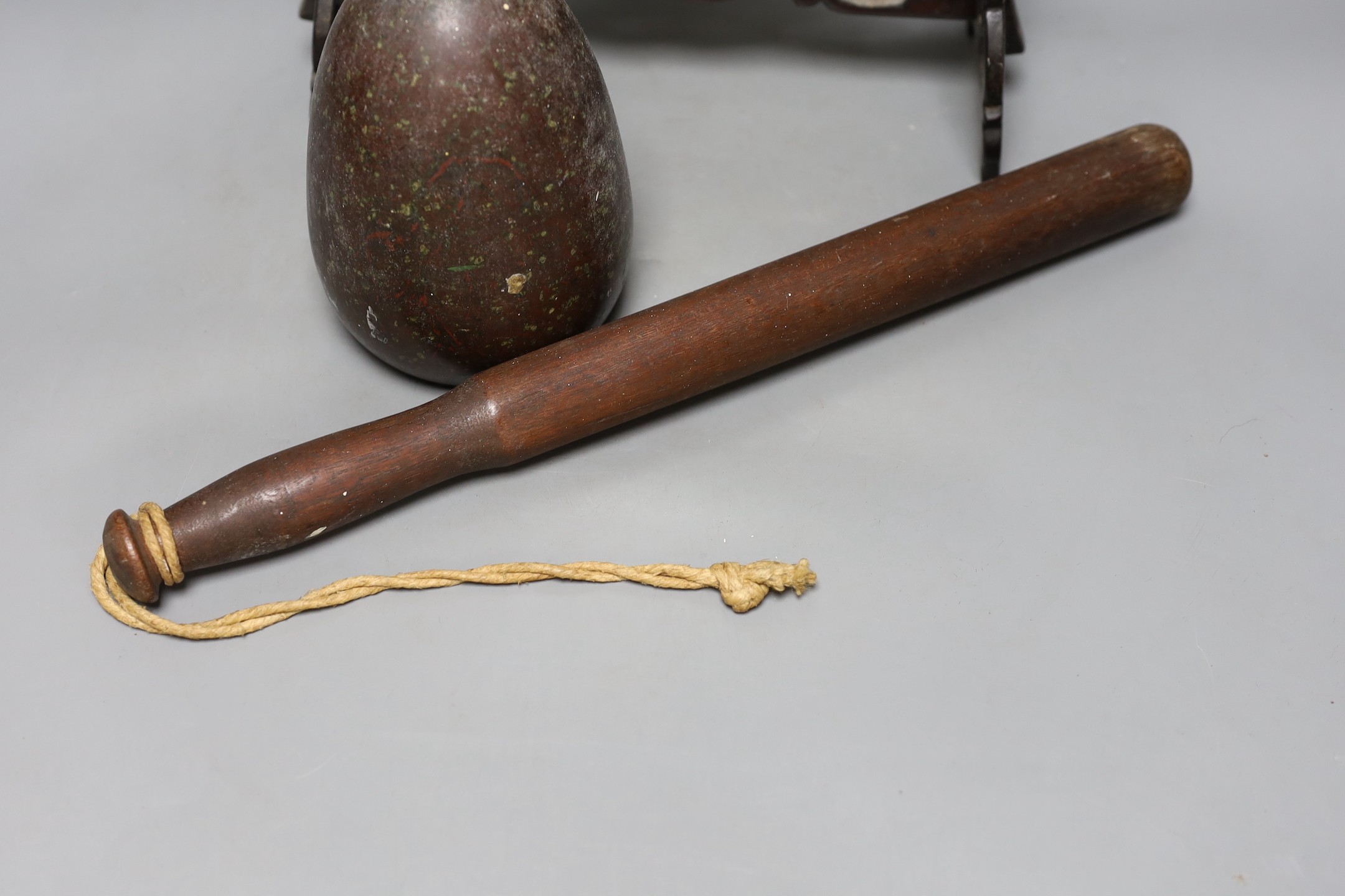 A Serpentine door-stop, Chinese table screen and a Victorian truncheon, Chinese table screen 46.5 cms high.